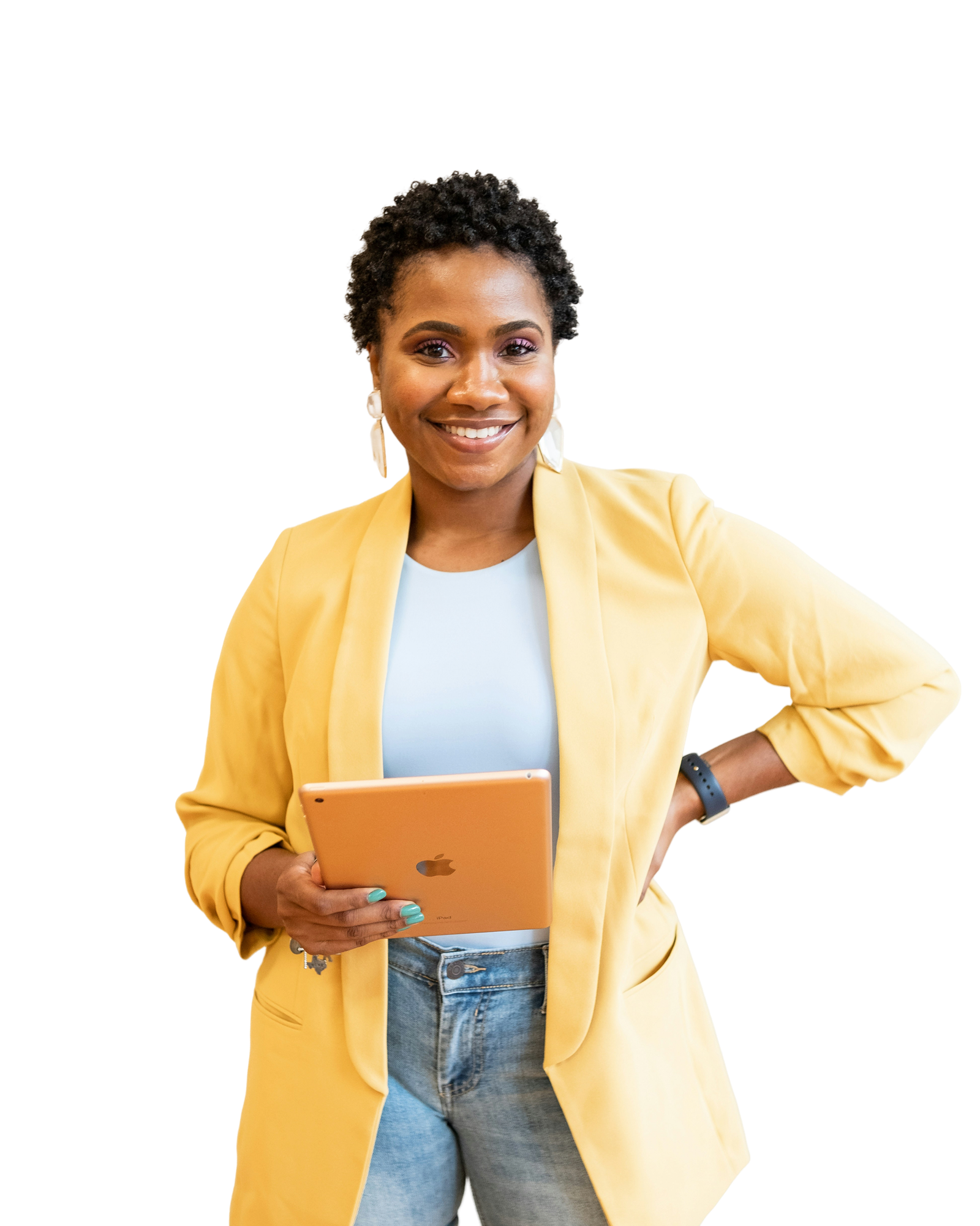 A woman in a yellow jacket smiling, representing inclusive workplace outcomes
